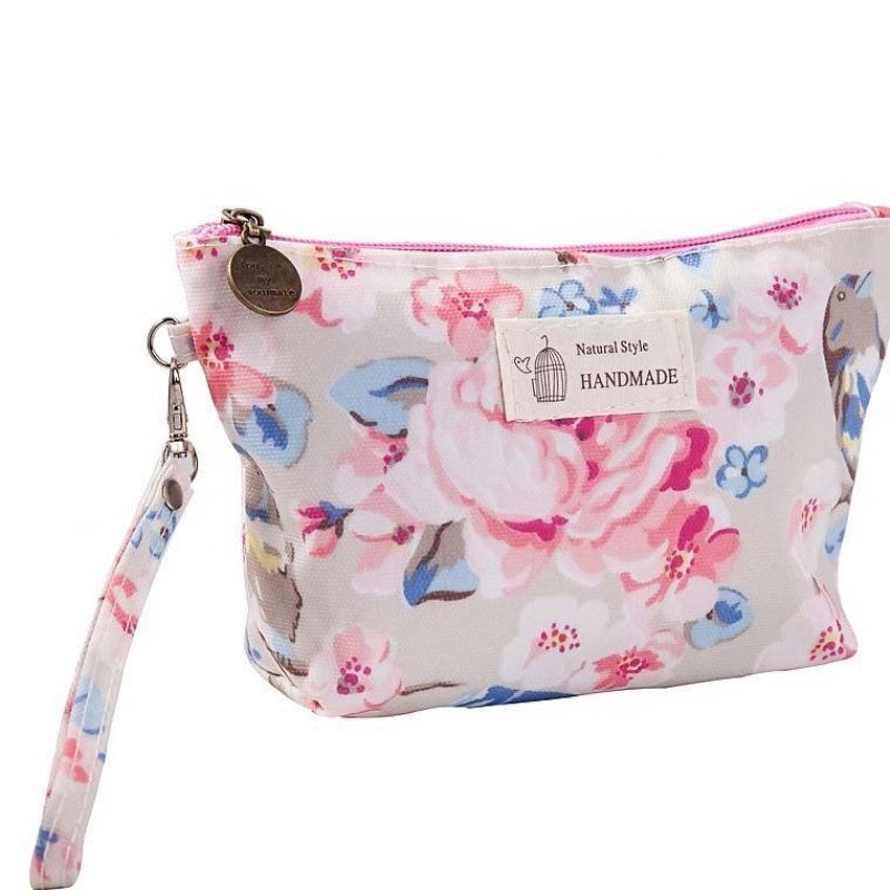 Monogram tarpaulin printed make-up bag