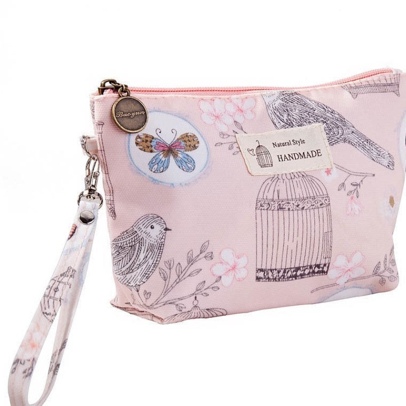 Monogram tarpaulin printed make-up bag